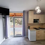 Apartament Pod świerkami *