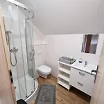 Pod świerkami