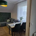 Pod świerkami